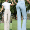 Ảnh sản phẩm số 13 quần golf ống loe nữ hack dáng thắt nơ túi sau KUZ212 PGM Golf Xanh
